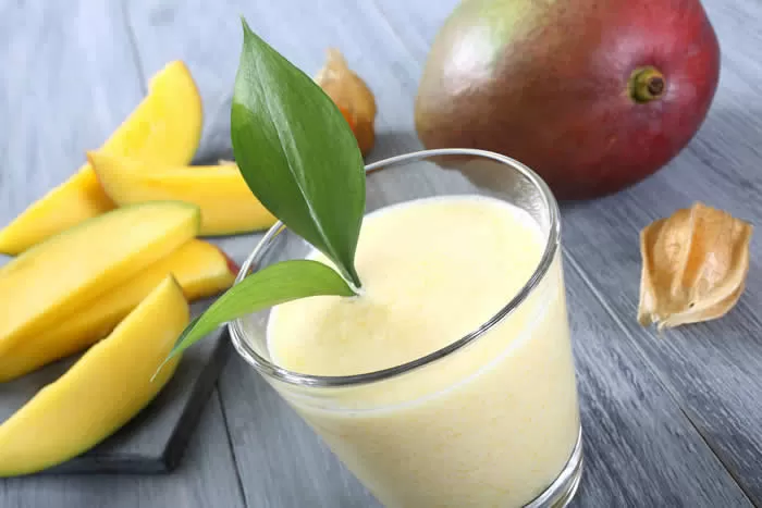 Mango Smoothie made in your Blendtec or Vitamix blender by @BlenderBabes